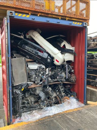 Import container of used car parts arriving from Japan